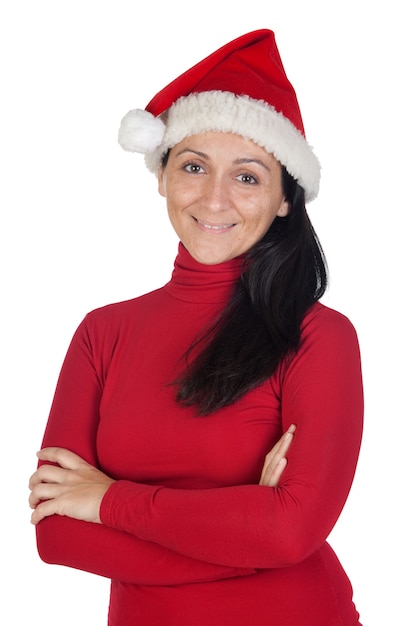 Hermosa chica con sombrero de Navidad sobre un fondo blanco