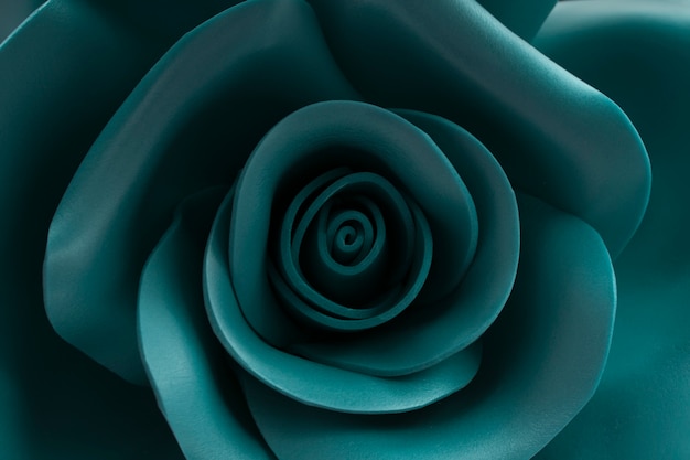 Una hermosa imagen de una rosa de color verde de cerca