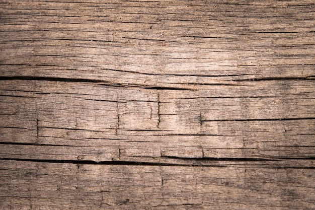 Hermosa mesa de madera envejecida primer plano vista superior Fondo de madera natural con grietas y textura