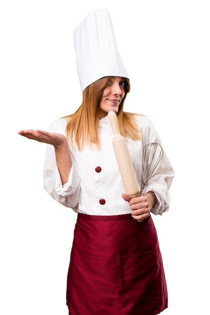 Foto hermosa mujer chef haciendo gesto sin importancia