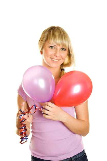 Hermosa mujer joven con globos