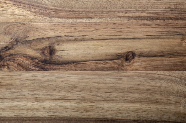 Hermosa textura de madera de acacia. Aspecto rústico con vetas, nudos y espacio de copia.