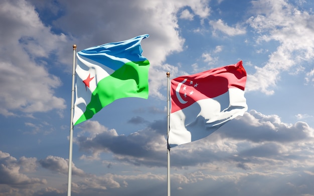 Hermosas banderas del estado nacional de Djibouti y Singapur juntos