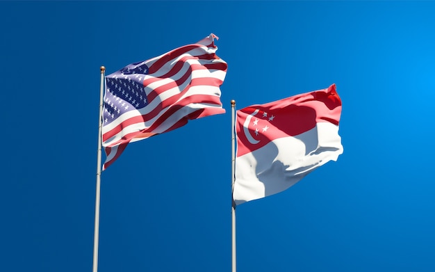 Hermosas banderas del estado nacional de Estados Unidos y Singapur juntos