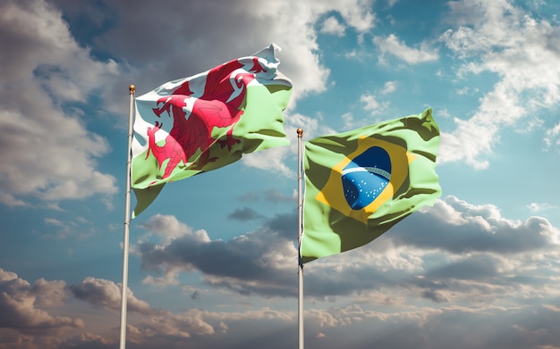 Hermosas banderas del estado nacional de Gales y Brasil juntos en el cielo azul