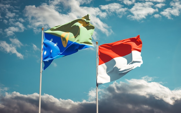 Hermosas banderas del estado nacional de Indonesia y la isla de Navidad juntos en el cielo azul