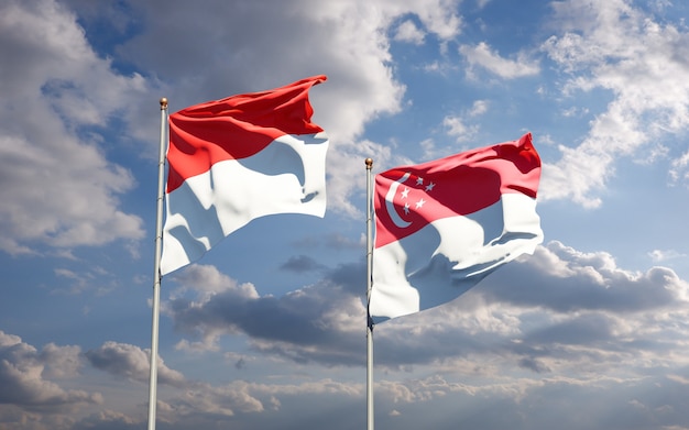 Hermosas banderas del estado nacional de Indonesia y Singapur juntos
