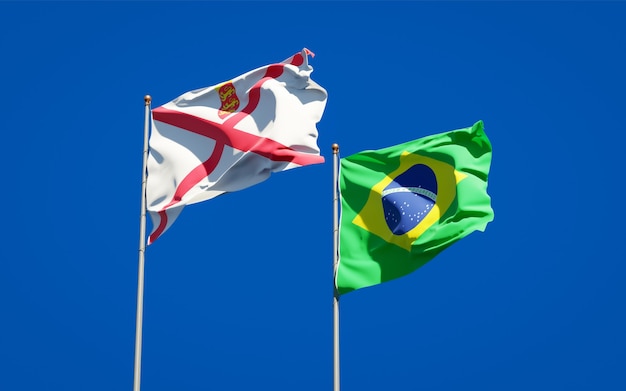 Hermosas banderas del estado nacional de Jersey y Brasil juntos en el cielo azul