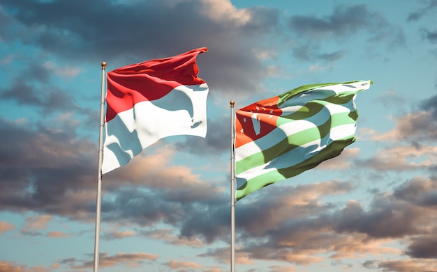 Hermosas banderas del estado nacional de Mónaco y Abjasia juntos