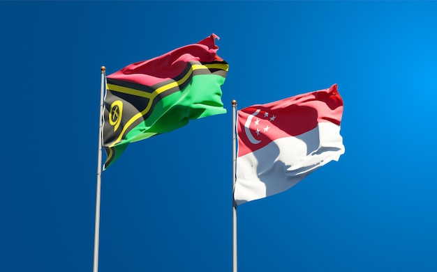 Hermosas banderas del estado nacional de Vanuatu y Singapur juntos