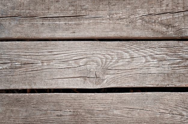 Hermoso fondo de madera con nudos y grietas