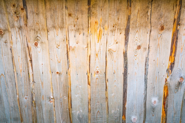 Hermoso fondo de una pared de madera con patrones de madera inusuales