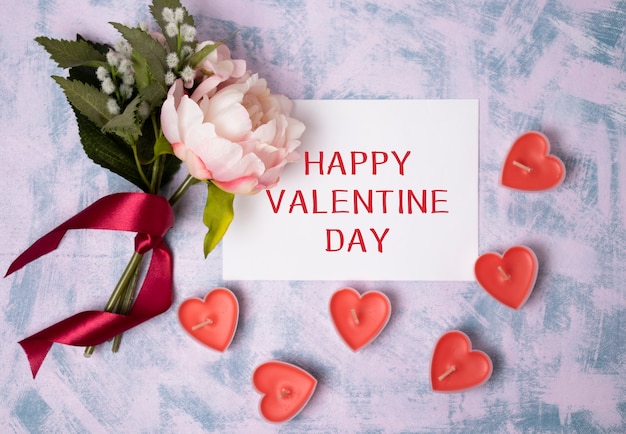 Hermoso fondo romántico con texto Feliz día de San Valentín.