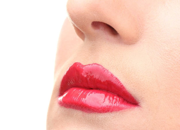 Hermoso maquillaje de labios glamour rojo brillo