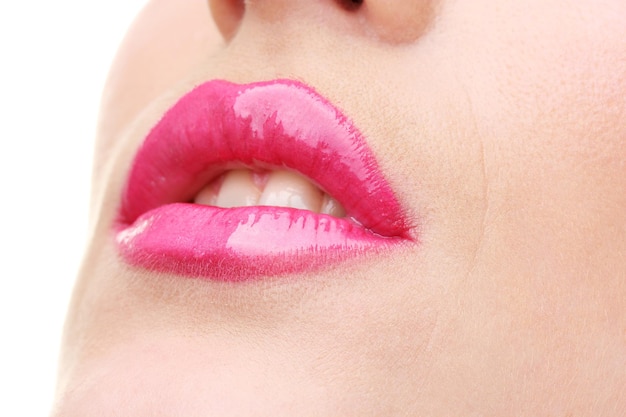 Hermoso maquillaje de labios glamour rosa brillo