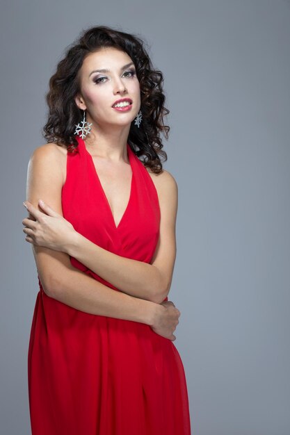 Hermoso, mujer joven, en, un, vestido rojo