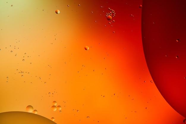 Hermosos fondos abstractos de agua y aceite mezclados en color naranja y rojo