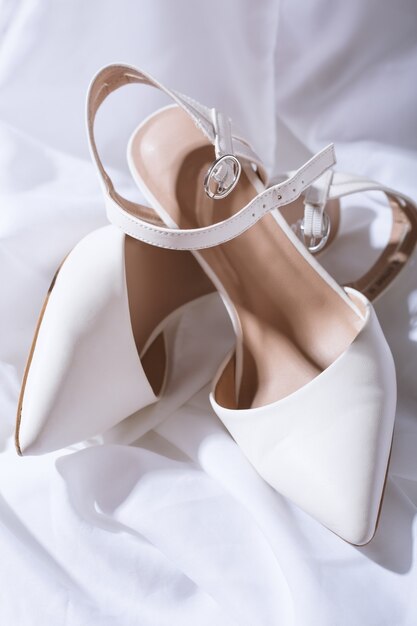 Foto hermosos zapatos de boda blancos para mujer