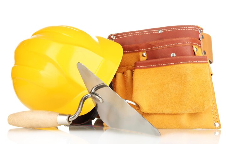 Foto herramienta de metal para la construcción y los accesorios del sitio de construcción aislados en blanco