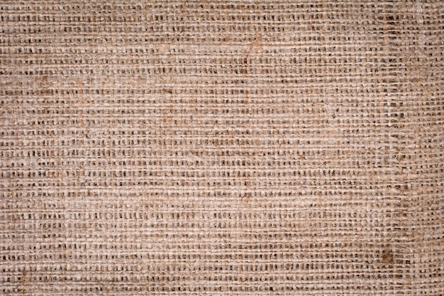 Hessian sackcloth tecido textura de fundo em tom de cor marrom creme bege claro