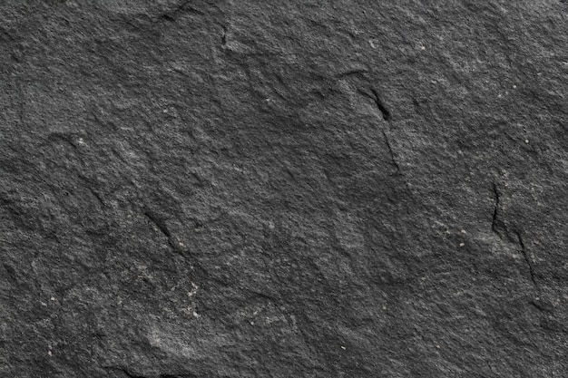 Hintergrund auf schwarzer Steinoberfläche