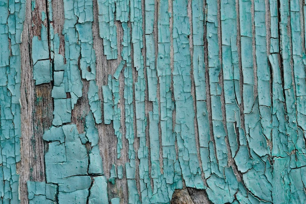 Hintergrund aus grünem flockigem Holz Hintergrund aus grün gefärbten Holzplatten mit gealterter flockiger Oberfläche