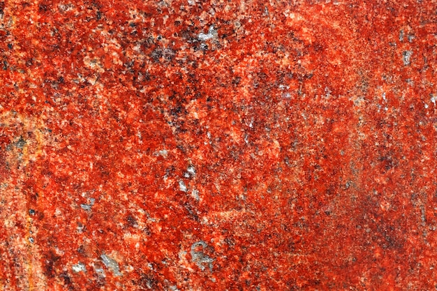 Hintergrund aus rotem Granit. Vorlage für die Gestaltung. ein Naturstein
