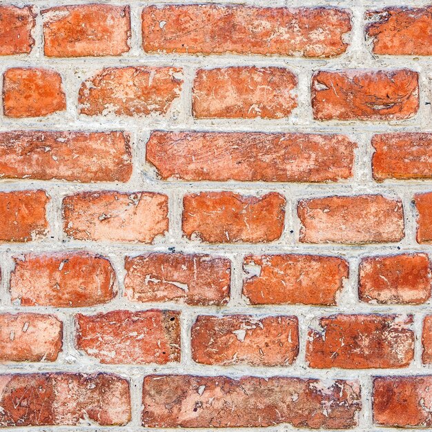 Foto hintergrund aus roter backsteinmauer.