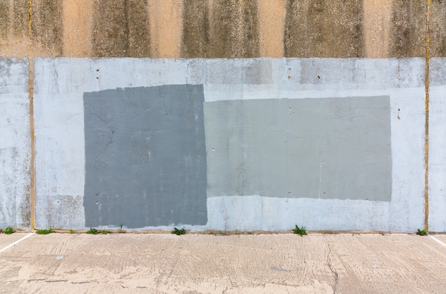 Hintergrund der alten grau gestrichenen Wand. Alter Straßenwandhintergrund, Beschaffenheit.