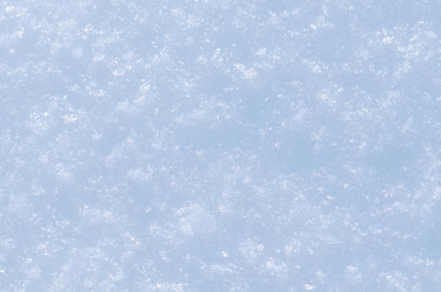 Foto hintergrund der natürlichen winterhintergrundschneebeschaffenheit des neuschnees im blauen ton