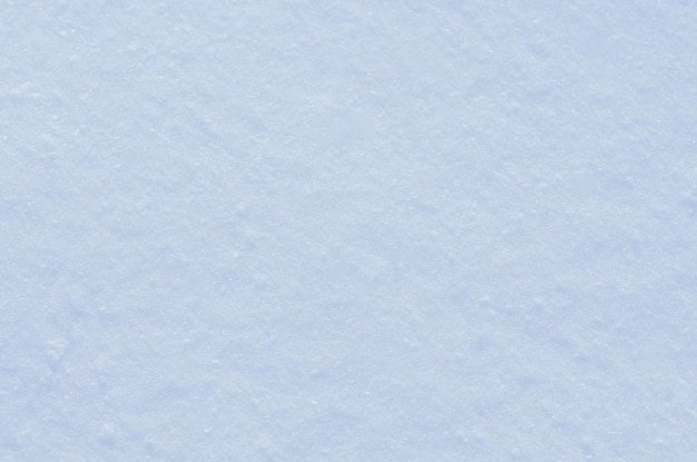 Foto hintergrund der neuen schneebeschaffenheit im blauen ton