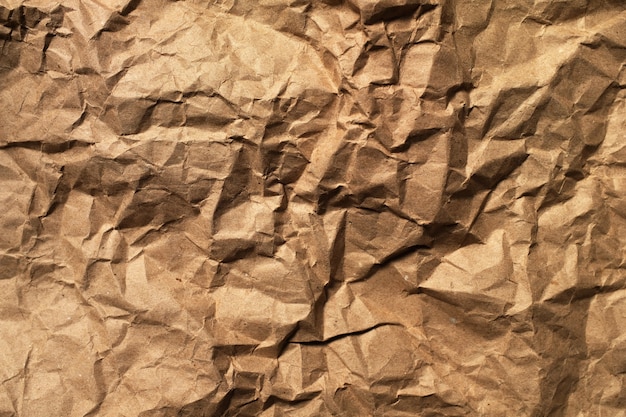 Hintergrund des braunen zerknitterten Papiers. Nahaufnahme