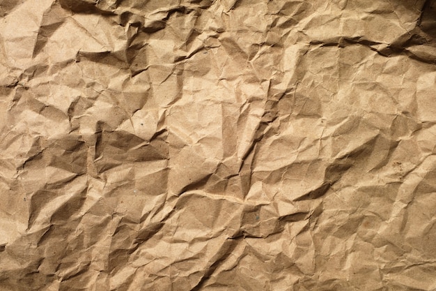 Hintergrund des braunen zerknitterten Papiers. Nahaufnahme