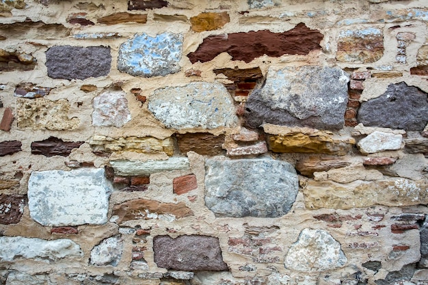 Hintergrund des Steinmauerbeschaffenheitsfotos. Hintergrund.