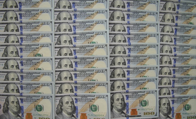 Hintergrund in Form von ausgebreiteten Dollarnoten