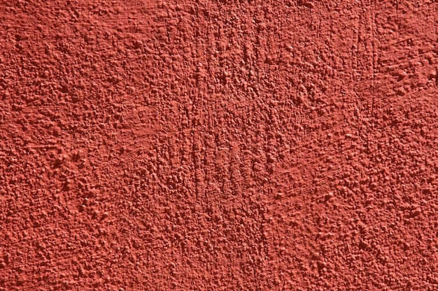 Hintergrund mit Wandbeschaffenheit mit roter Farbe.