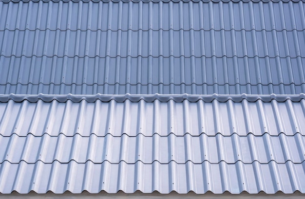 Hintergrund und Textur von grauen Dächern aus gewellten Faserzementziegeln in perspektivischer Ansicht