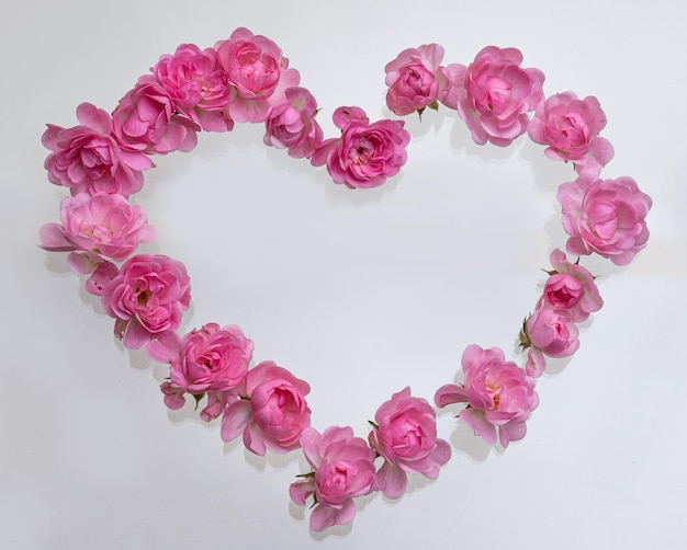 Hintergrund Valentinstag Herzförmiger Bouquet aus wunderschönen rosa Rosenblumen