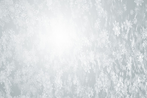 Hintergrund vieler fallenden Schneeflocken auf einem grauen Hintergrund