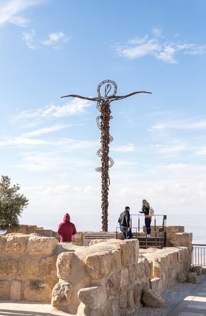 Foto hintergrundansicht von menschen auf dem kreuz gegen den himmel