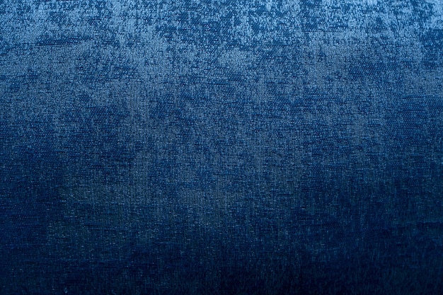 Hintergrundtapete des blauen Teppichs der Nahaufnahme