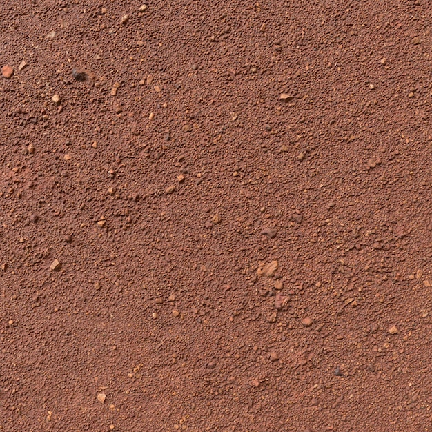 Hintergrundtextur aus roten Laterit-Bodensteinen, Draufsicht und Nahaufnahme von Laterit-Bodensteinen