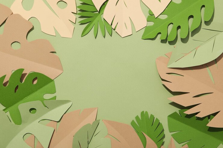 Hojas tropicales verdes de papel sobre un fondo verde con un pájaro flamenco