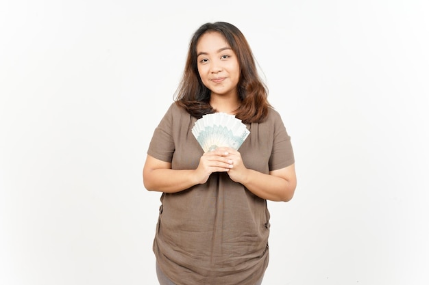 Holding-Banknote zweitausend Rupiah der schönen asiatischen Frau, Isolated On White Background