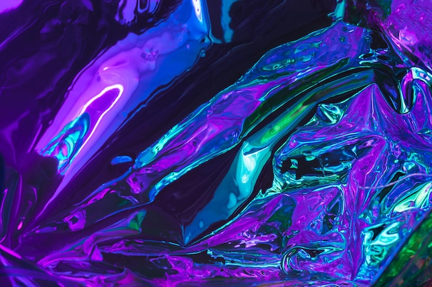 Holograma amassado brilhante de fundo abstrato com brilhos Fundo texturizado de néon na moda