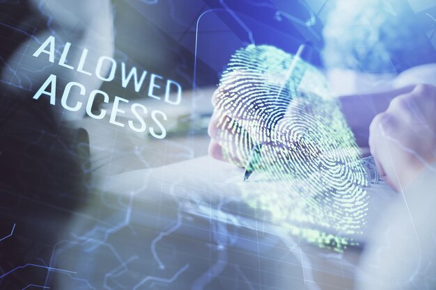 Holograma azul de huellas dactilares sobre manos tomando notas de fondo Concepto de seguridad Doble exposición