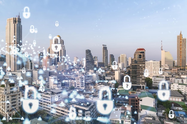 Holograma de ícone de cadeado sobre a vista panorâmica da cidade de Bangkok para proteger os negócios no sudeste da Ásia O conceito de escudos de segurança da informação Dupla exposição