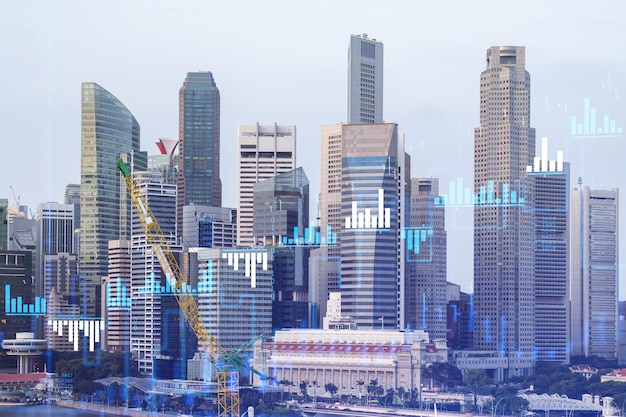 Holograma do gráfico de ações financeiras sobre a vista panorâmica da cidade do centro de negócios de cingapura na ásia o conceito de transações internacionais dupla exposição