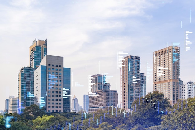 Holograma gráfico de ações financeiras sobre a vista panorâmica da cidade do centro de negócios de Bangkok no sudeste da Ásia O conceito de transações internacionais Dupla exposição