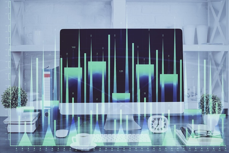 Foto holograma de gráfico de divisas en la mesa con fondo de computadora doble exposición concepto de mercados financieros